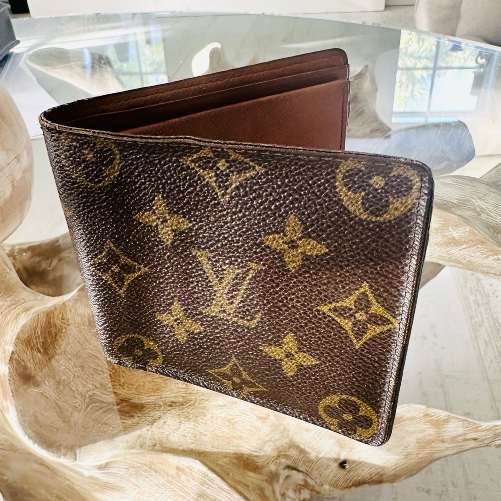 Louis Vuitton Monogram Canvas vintage wallet. Pre-loved purchased on Real Real